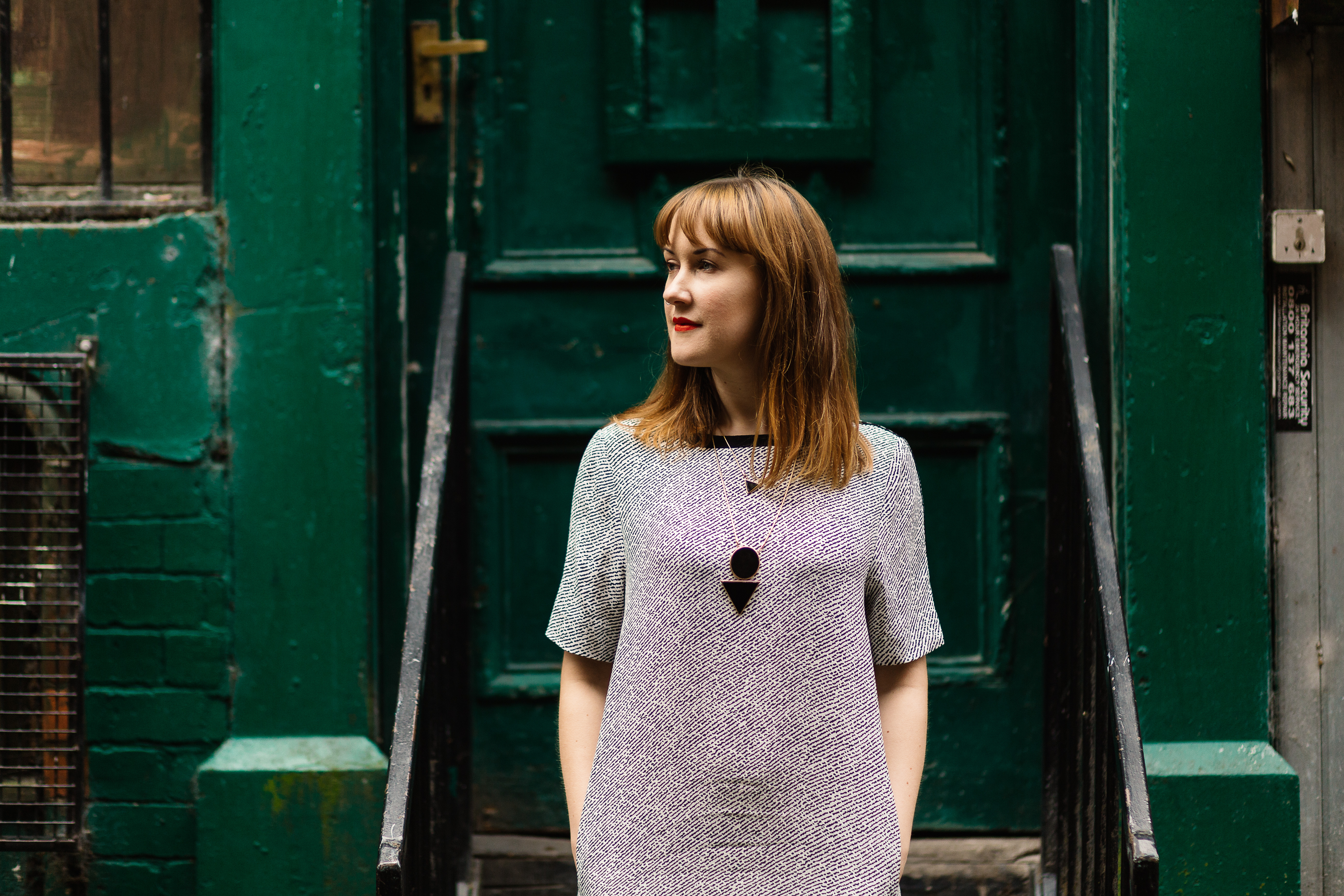 Picture of Rebekah in front of green door